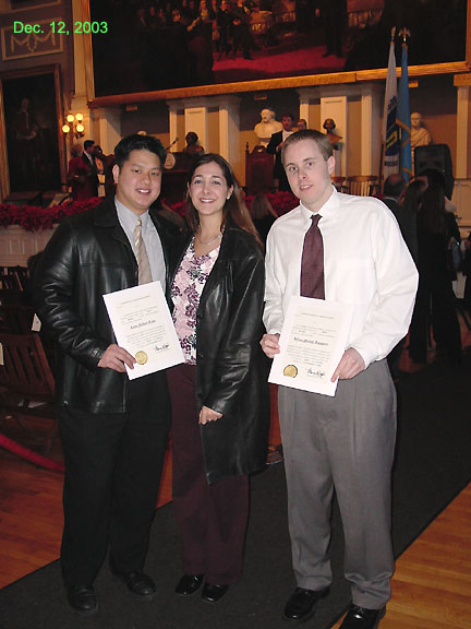 Austin, Elena, and Jeff Townsend.  Austin escort Jeff to receive his license.